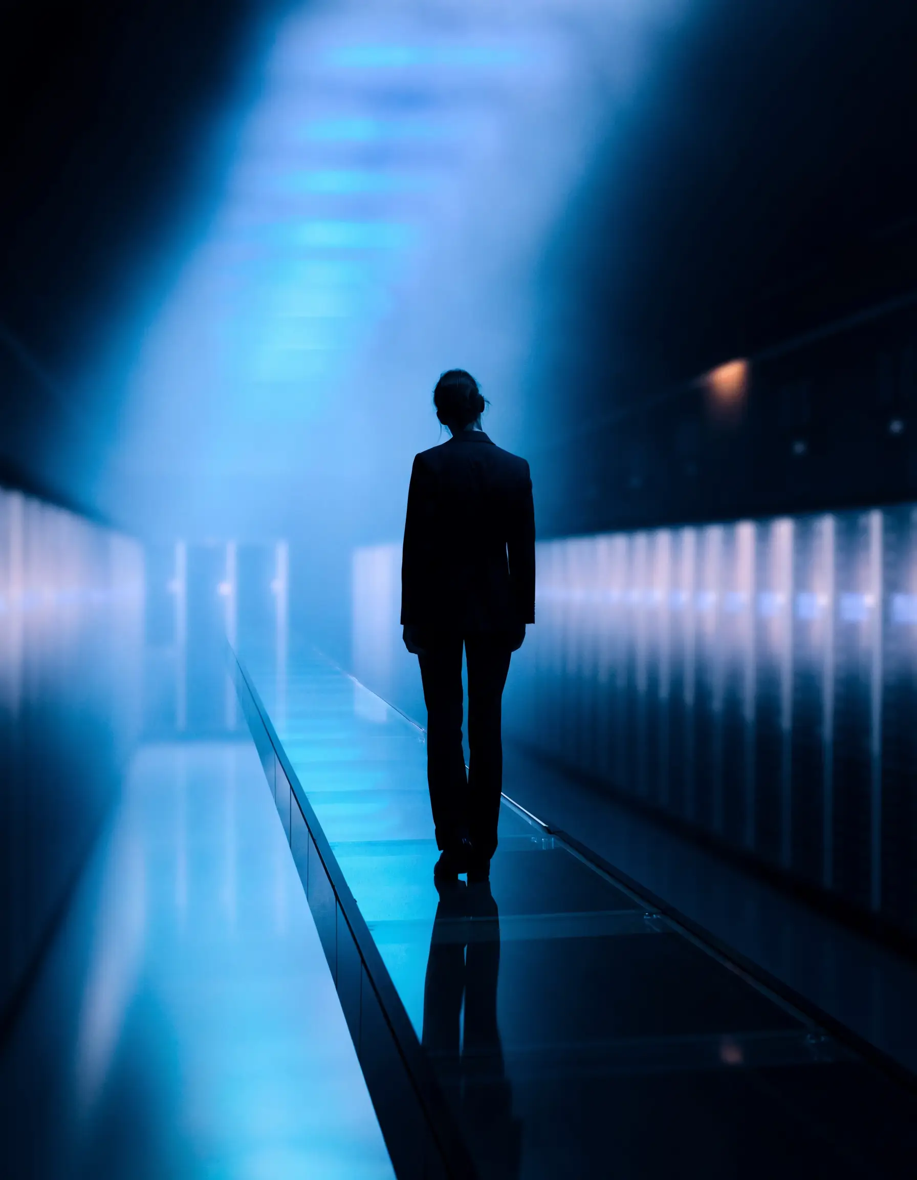 A private-cloud data centre interior with illuminated infrastructure.